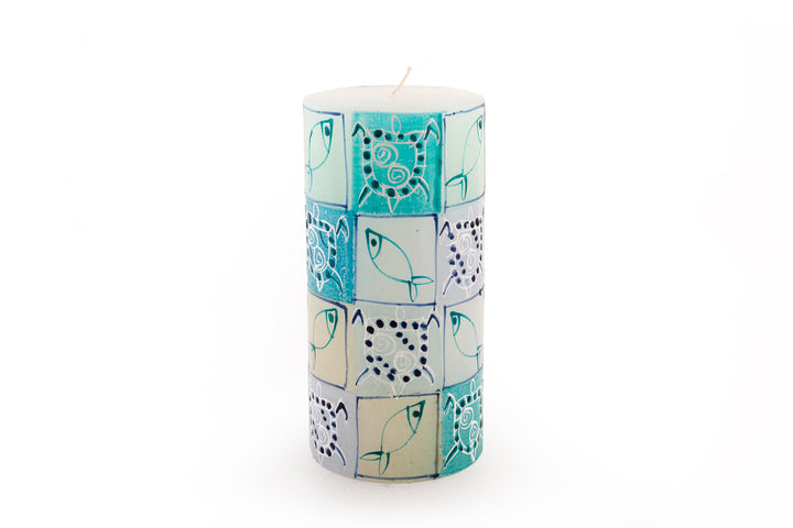Arniston 3 x 6 pillar candle.  Fish and turtles painted on the pillar in turquoise, blue, sea green and cream.  White base candle. 