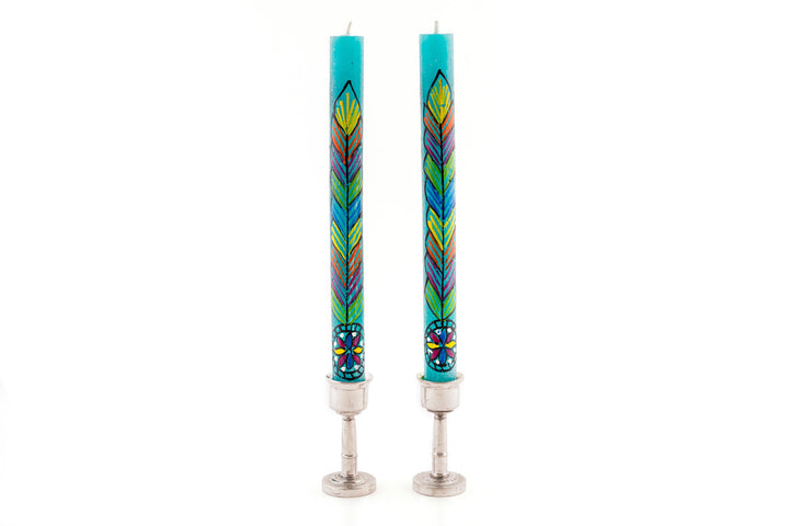 Hippie taper pair in pewter taper holders.  Turquoise wit colorful feather painted up the taper.  Tapers come as a matched pair.