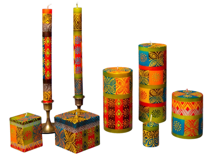 Desert Rose handmade and hand painted candle collection.  Beautiful colors of the African desert; golden yellow, turquoise blue,  browns, orange. - warm and stunning.  Fair Trade home decor.