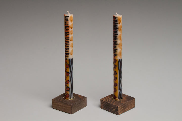 Taper Candle Holders in dark brown hand crafted by Detroit artisans out of reclaimed wood, available in 3 colors.