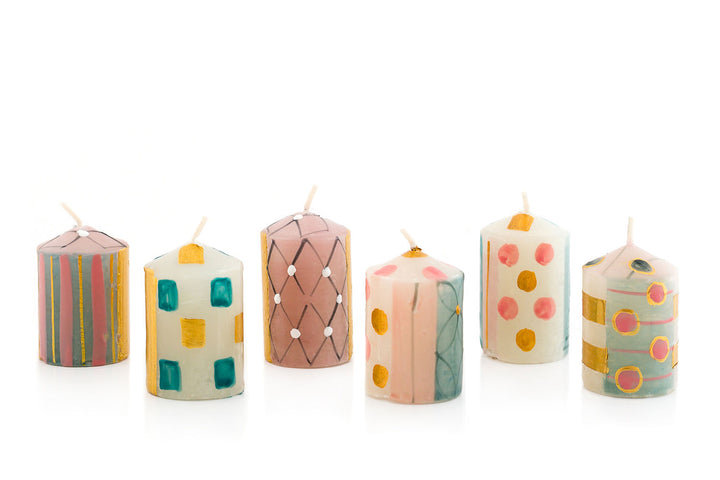 Pastel Gold votive candle selectin on pink, turquoise and gold. Sold in a gift pack of 6. Fair Trade home decor.