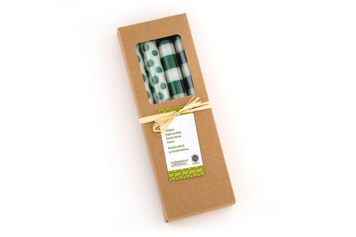 Green dot & stripe taper candles; two of each design, presented in a kraft gift box  and story card.
