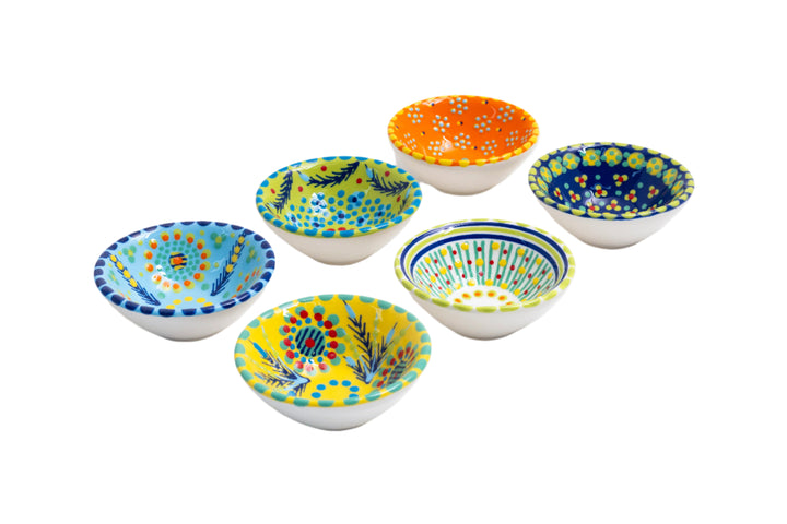 Tiny bowls in various background colors; baby blue, lime green, orange, indigo, white & yellow.  Painted with sweet designs of flowers, dots, stripes in contrasting colors.