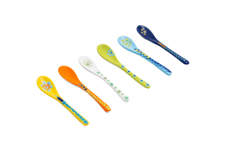 Selection of 6 small ceramic spoons; base colors in yellow, orange, white, lime green, baby blue & indigo.  Painted detail in same contrasting colors. Great for condiments.