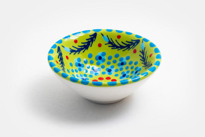 Tiny ceramic bowl, Lime green background with mixed patterns of dots & stripes in different sizes and colors. Microwave & Dishwasher safe.
