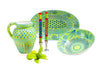 Wonderful lime green water jug, large oval serving bowl, and large round serving bowl along side a water jug and pair of carousel taper pairs. Lovely collection!