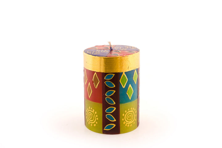 African Mineral 3x4 pillar candle. African designs in wonderful rich colors of turquoise, red, blues, purple, and gold.