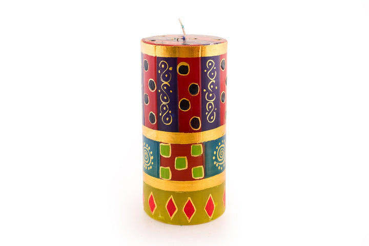 African Mineral 3x6 pillar candle.African designs in wonderful rich colors of turquoise, red, blues, purple, and gold. 