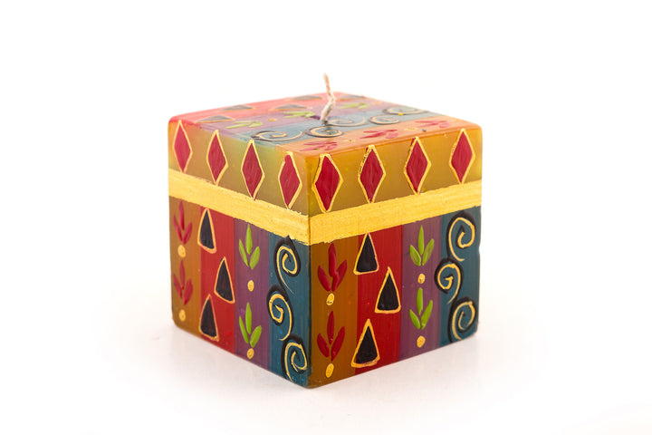African Mineral 3x3x3 candle cube.  African designs in wonderful rich colors of turquoise, red, blues, purple, and gold.