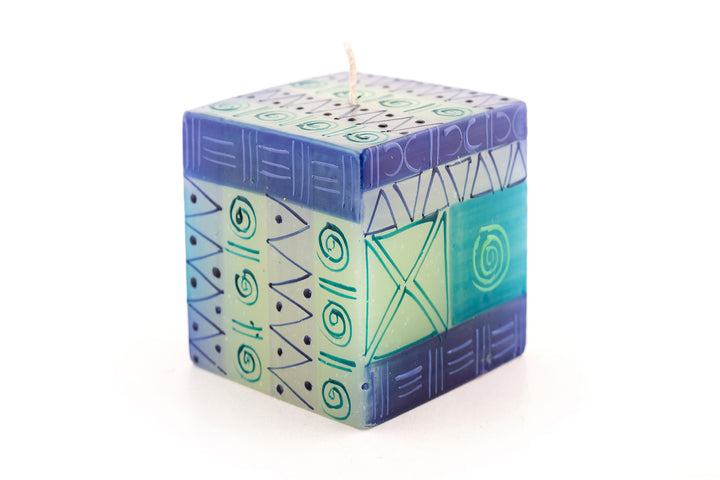 Blue & Green 3x3x3 cube candle. Indigo blue, turquoise, greens and touch of purple in various circle and triangle designs.