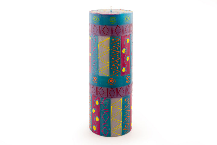 Blue Moon 3x8 pillar candle.  Turquoise, fuchsia, and purple main colors  with touches of yellow & orange.