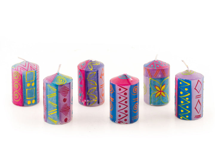 6 Blue Moon votives in various designs in turquoise, blue, fuchsia, with yellow, orange and red touches.  6 votives come in a gift pack.
