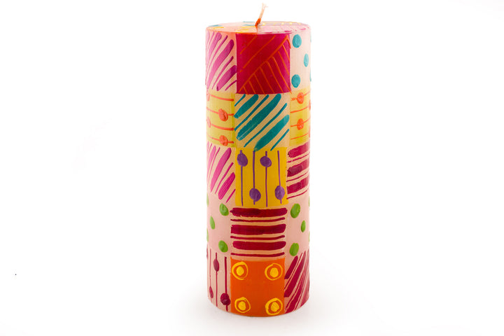 Carousel 3x8 pillar candle. Dots, stripes and circles in pinks, purple, yellow, red, greens and turquoise!