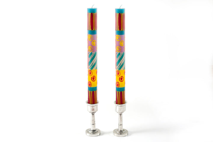Matched taper pair of Carousel candles in pewter taper holders.  Dots & stripes in pinks, yellow, turquoise, and greens!