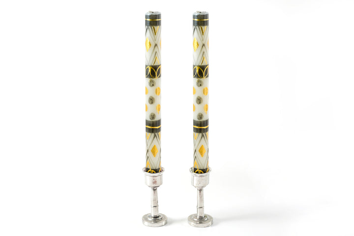 Celebration taper pair standing in pewter taper holders.  Black, grey, gold and white - perfect to light up any celebration!