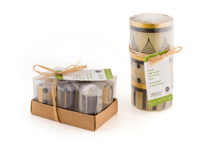 All candles come wrapped in sustainable cello with a story card.  Votives are packed in small box of 6 tied with story card.
