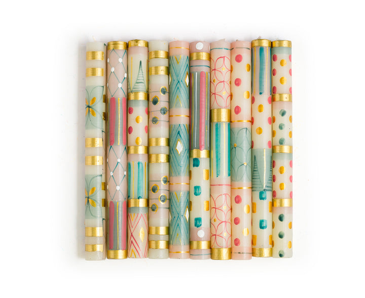 10 designs of Delight. 10 tapers,one in each color & design variation.  Pink, Gold, Turquoise, and white. 