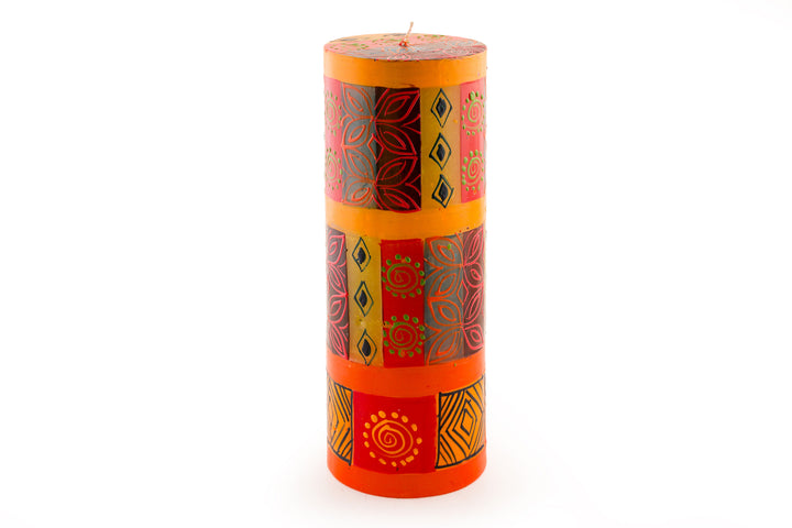 Desert Rose 3x8 pillar candle.Beautiful colors of the African desert; golden yellow, turquoise blue, browns, orange painted in blocks of color with abstract patterns on top. 