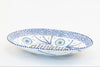 White oval serving bowl with dots, stripes and small flowers painted in baby blue, green and yellow. 15" x 8". Beautiful addition to your dinner table!