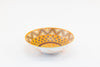 Orange large round ceramic serving bowl. 11"x 3".  Orange inside background, painted in floral pattern with yellow, lime green,  and baby blue.  White outside with orange accent design. Microwave & Dishwasher safe.