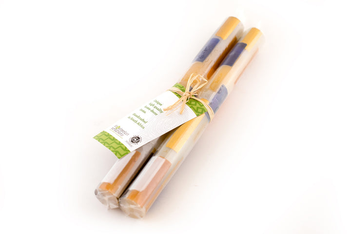 Klimt tapers come individually wrapped in a matched pair, tied with a story card.