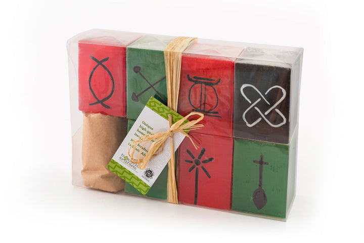 Kwanzaa Cube Collection comes in a gift package of the 7 cube candles, tied with a story card. Each cube carries a different traditional Kwanzaa symbol. Fair Trade home decor.