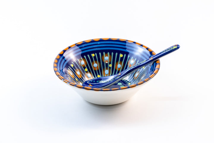 Indigo blue ceramic mini nut bowl with matching ceramic small spoon in Indigo Blue. Dots & Stripes on top of base color in orange, yellow, & turquoise and green.  Perfect pair!