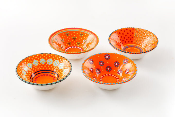 4 Mini Nut bowls with orange base color. Dots & Stripes on top in red, turquoise, indigo, yellow  & jasper green. Each bowl with a unique design.