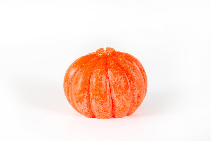 Back view of Whimsy Pumpkin candle! Orange with 'pumpkin skin' look.