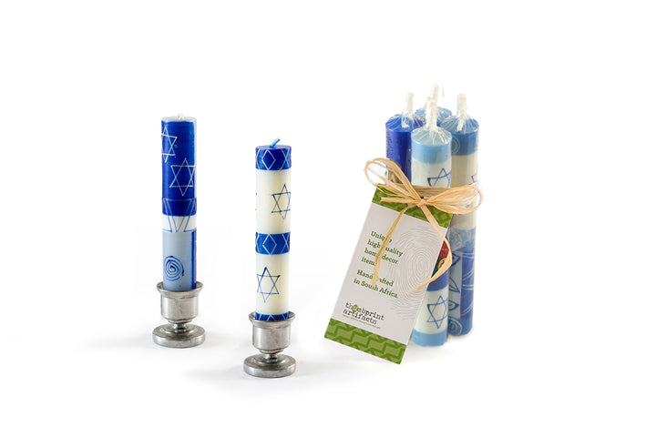 Blue Star of David design hand painted on white 4" taper Shabbat candles. Shipped in pack of 4 with story card. Fair Trade made in South Africa.