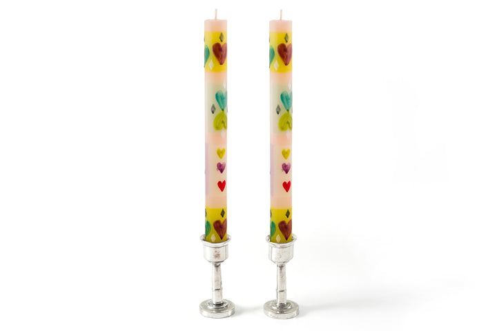 Example of Pastel Hearts taper pair in pewter taper holders. Pairs come with matched design.