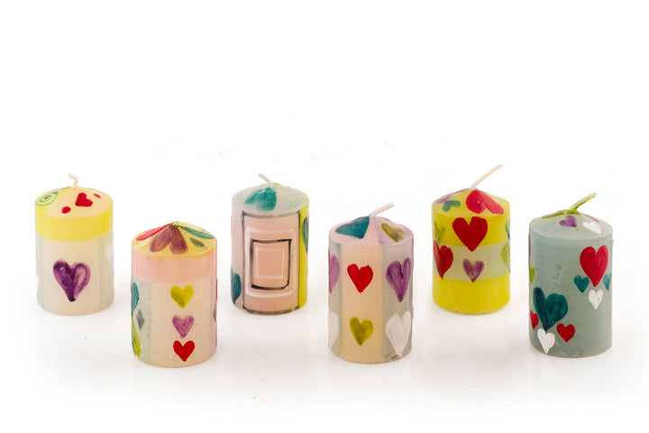 6-Pastel Heart votives painted in various patterns in the Pastel Heart collection. Very cute and come in a gift pack of 6.