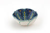 Ceramic Poppy Ramekin!  Sweet little bowl in the shape of a poppy flower.  White outside and indigo inside base color. Painted on top of the base color with dots, flowers, and fern designs in lime, baby blue, orange & yellow.