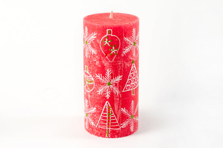 Whimsy Christmas 3" x 6"  Pillar Candle. This one has a red base color and hand painted with trees, snow flakes and Christmas ornaments in white with red, green highlights.