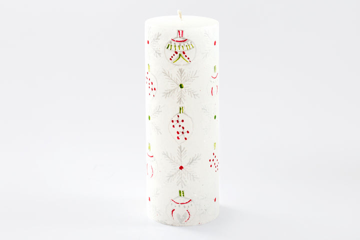 Whimsy Christmas 3" x 8" Pillar Candle. This one has a white base color and hand painted with trees, snow flakes and Christmas ornaments in white with red, green highlights.