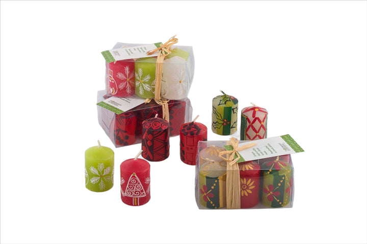 Votive 2" candles in Whimsy Christmas, Berry Blaze, and traditional Christmas to show that they look great together - so mix and match!  The photo shows the presentation of the 6-pack box with story tag.
