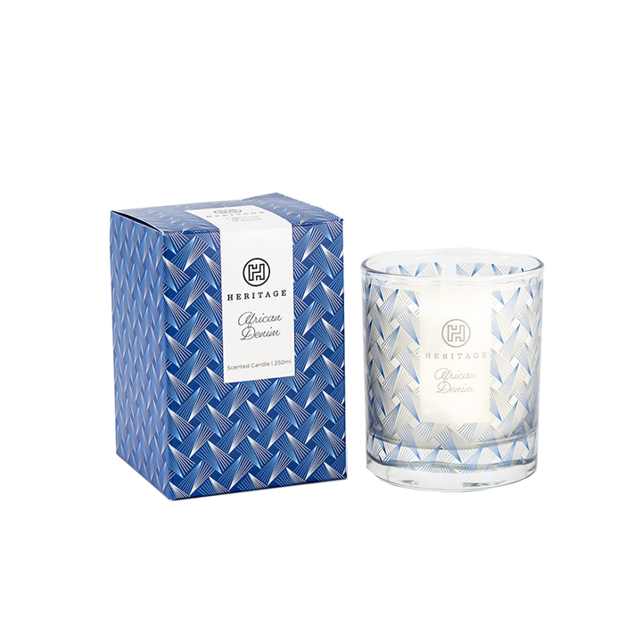 African Denim 250ml candle in a glass jar and gift box.  The design is a traditional blue denim design on both the box and glass jar of the candle is worn by the Zulu's. 