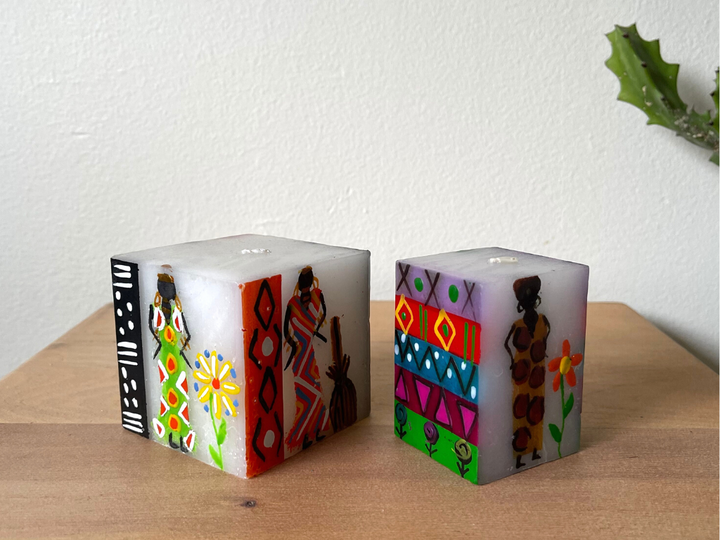 African Ladies cube hand made candles.  3x3x3 and 2x2x3.