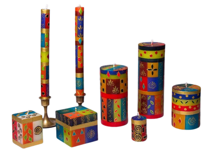 Beautiful colors of Africa are painted on these hand made candles.  The collection is available in tapers, pillar candles, cube candles and votive candles.