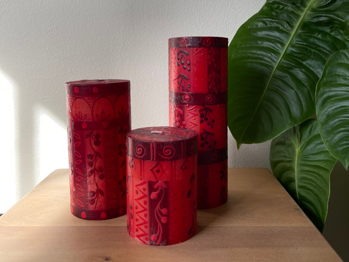 Berry Blaze candles available in 3x4 pillar candle, burns 60 hoiurs, 3x6 pillar candle that burns 80 hours, and 3x8 pillar candle that burns 100 hours.