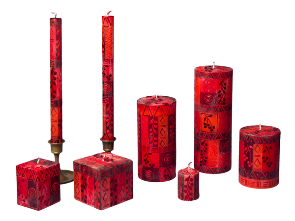 Berry blaze hand painted candle collection.  Bright red with darker berry design.  Beautiful glow from inside as they burn. Fair Trade.