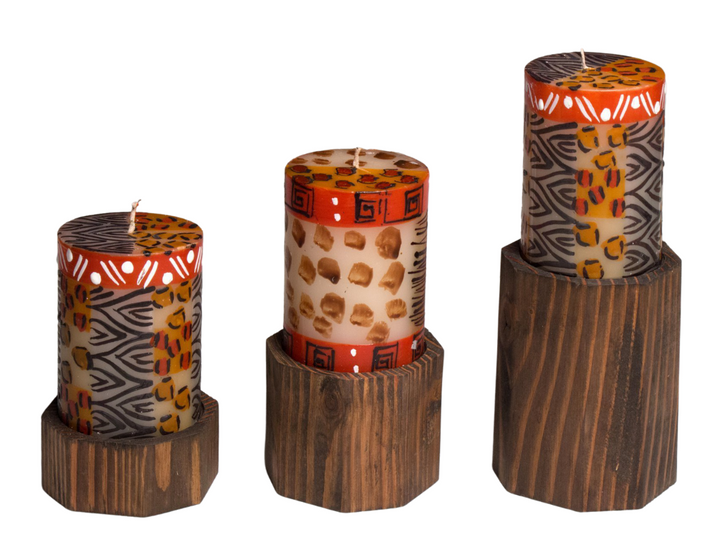 Hand crafted pillar candle & taper candle holders in dark reclaimed wood.