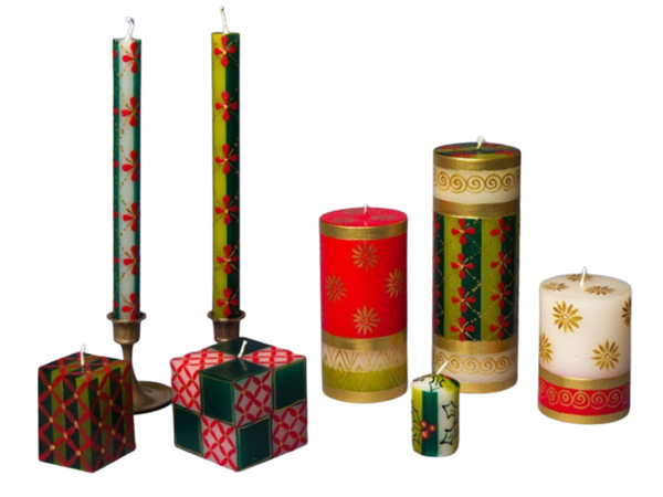 Traditional Christmas candle collection.  Taper candles, pillar candles, cube candles, and votive candles hand painted in various traditional Christmas patterns. Fair Trade home decor.  Made in South Africa.
