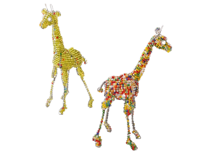 African Giraffes handmade from recycled silver wire and a mix of transparent and opaque beads. There are two giraffes; left has a base of bright yellow beads with pops of red, orange, and green. Giraffe on right is multi colored with hues of red, orange, bright yellow, lime green, and blue.
