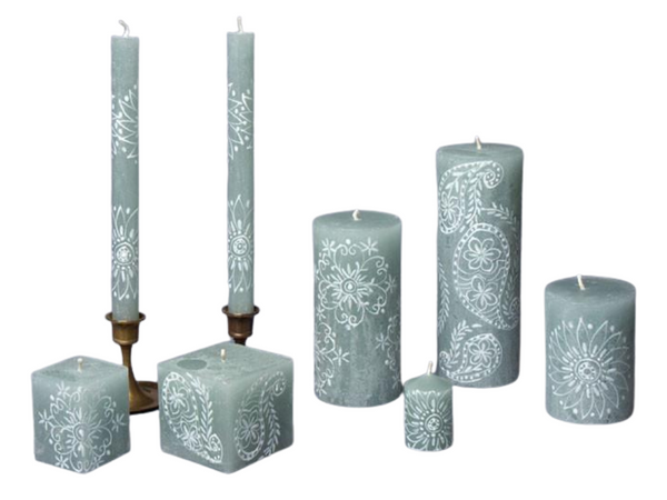 Henna Duck Egg handmade and hand poured candle collection has henna designs painted in white on bearutiful duck egg green candles.  Dinner taper candle, pillar candles, cube candles, and 2" votive.  Stunning Fair Trade home decor.