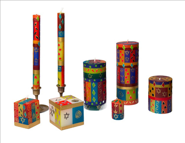 Judaica design on  handcrafted candle collection made in South Africa. Fair trade home decor.  Colorful with  touches of gold and star of David.