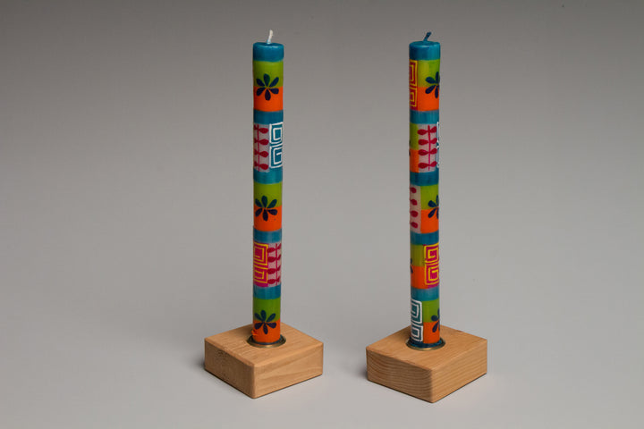 Taper Candle Holders in golden stain hand crafted by Detroit artisans out of reclaimed wood, available in 3 colors.
