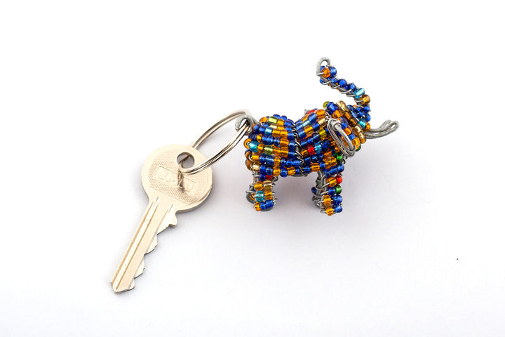 Beaded elephant key chain, handmade with blue & golden beads.  Truck up for good luck!
