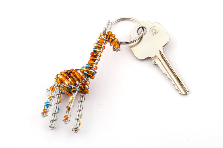 Beaded giraffe keychain, handmade in golden & blue beads. So cute! Fair Trade products.