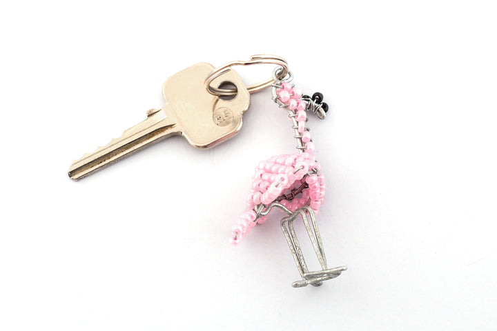 Beaded pink flamingo key chain. Handmade with a pink body and black beak.  Sweet!  Fair trade.